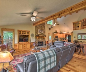 Spacious Riverfront Retreat with Deck and Hot Tub