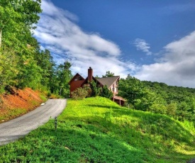 WILD THINGS enjoy the North Georgia Mountain View with this Wall of Windows!!!!