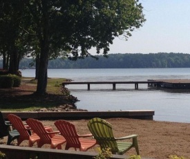 Relax on our large porches with spectacular lakefront views at Westover Cottage